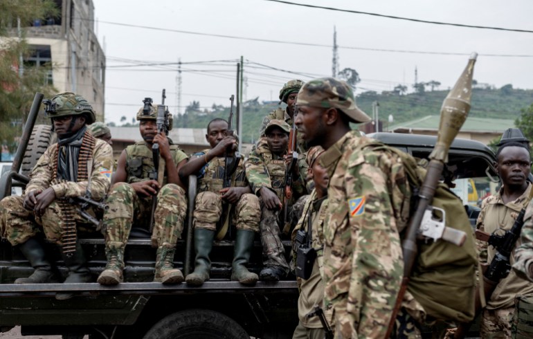 Members of the M23 rebel group gather to supervise Congolese potential recruits for the M23 rebel group before being taken to training centres run by M23 rebels, amid clashes between M23 rebels and the Armed Forces of the Democratic Republic of the Congo (FARDC), in Goma, North Kivu province in eastern Democratic Republic of the Congo, January 30, 2025. REUTERS/Arlette Bashizi