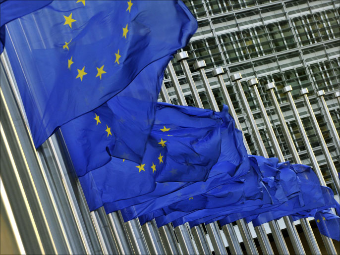 European flags fly at half-mast as a tribute to late South African anti-apartheid icon Nelson Mandela at the Berlaymont European Union Commission buiding in Brussels on December 6, 2013. Former South-African President Mandela, a global colossus and Nobel peace laureate died on December 5 aged 95. AFP PHOTO / GEORGES GOBET