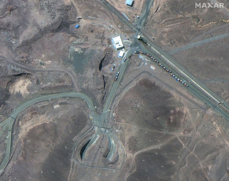 A satellite image shows trucks positioned near the entrance of the Fordow fuel enrichment facility, near Qom, Iran June 19, 2025. Maxar Technologies/Handout via REUTERS THIS IMAGE HAS BEEN SUPPLIED BY A THIRD PARTY. NO RESALES. NO ARCHIVES. MANDATORY CREDIT. MUST NOT OBSCURE LOGO