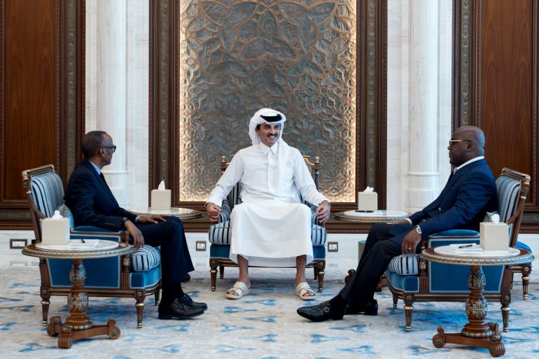 This handout image provided by the Qatari Ministry of Foreign Affairs (MOFA) shows Qatar's Emir Sheikh Tamim bin Hamad Al Thani(C) meeting with Rwandan leader Paul Kagame (L) and DRC President Felix Tshisekedi in Doha on March 18, 2025.