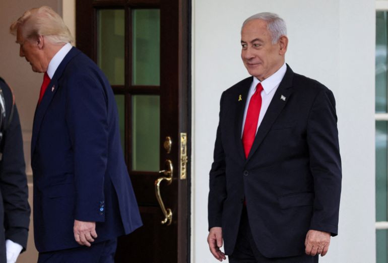 FILE PHOTO: U.S. President Donald Trump and Israeli Prime Minister Benjamin Netanyahu walk to enter the White House in Washington, D.C., U.S., April 7, 2025. REUTERS/Leah Millis/File Photo