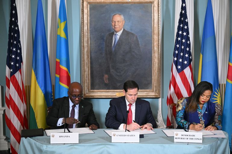 US Secretary of State Marco Rubio (C) hosts a peace agreement signing with Democratic Republic of the Congo Foreign Minister Thérèse Kayikwamba Wagner (R) and Rwandan Foreign Minister Olivier Nduhungirehe (L) at the State Department in Washington, DC, on June 27, 2025. Rwanda and the Democratic Republic of Congo signed an agreement in Washington on Friday to put an end to a conflict in the eastern DRC that has killed thousands, although broad questions loom on what it will mean. Trump has trumpeted the diplomacy that led to the deal and publicly complained that he has not received a Nobel Peace Prize. But the agreement has also come under scrutiny for its vagueness including on the economic component, with the Trump administration eager to compete with China and profit from abundant mineral wealth in the long-turbulent east of the vast DRC. (Photo by Mandel NGAN / AFP)