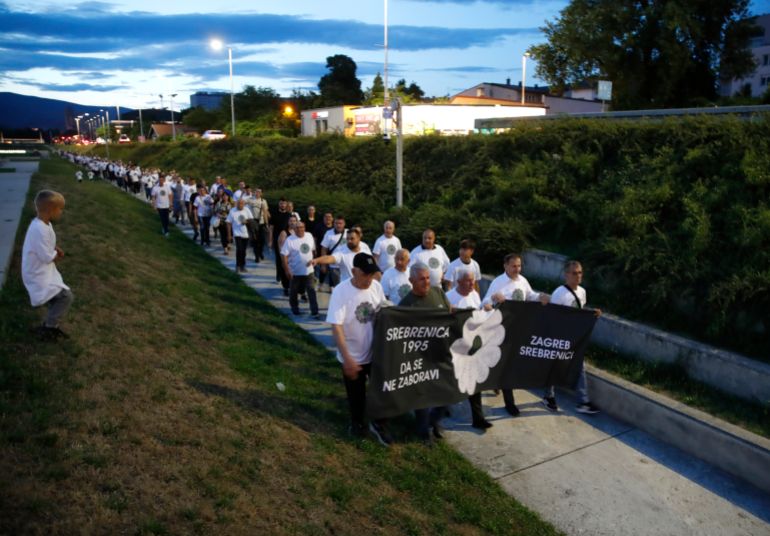 epa12230306 Citizens pass through the town in the memory of 30 years Srebrenica genocide in Zagreb, Croatia, 10 July 2025. Victims of the genocide will be buried in Srebrenica at the Potocari Memorial Center on the 29th anniversary of the massacre on 11 July 2024. Bosnian Serb soldiers massacred 8,372 Bosnian Muslim men after capturing the former Bosnian Muslim enclave in Srebrenica on 11 July 1995, during the war in Bosnia and Herzegovina from 1992 to 1995. EPA/ANTONIO BAT