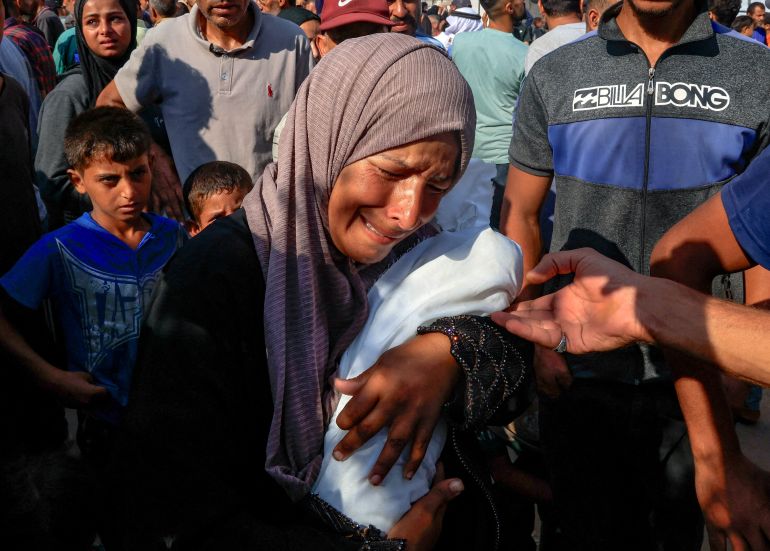Palestinian mother Alaa Al-Najjar mourns her three-month-old baby Yehia, who died due to malnutrition amid a hunger crisis, according to medics, at Nasser Hospital in Khan Younis, in the southern Gaza Strip July 20, 2025. REUTERS/Hatem Khaled TPX IMAGES OF THE DAY