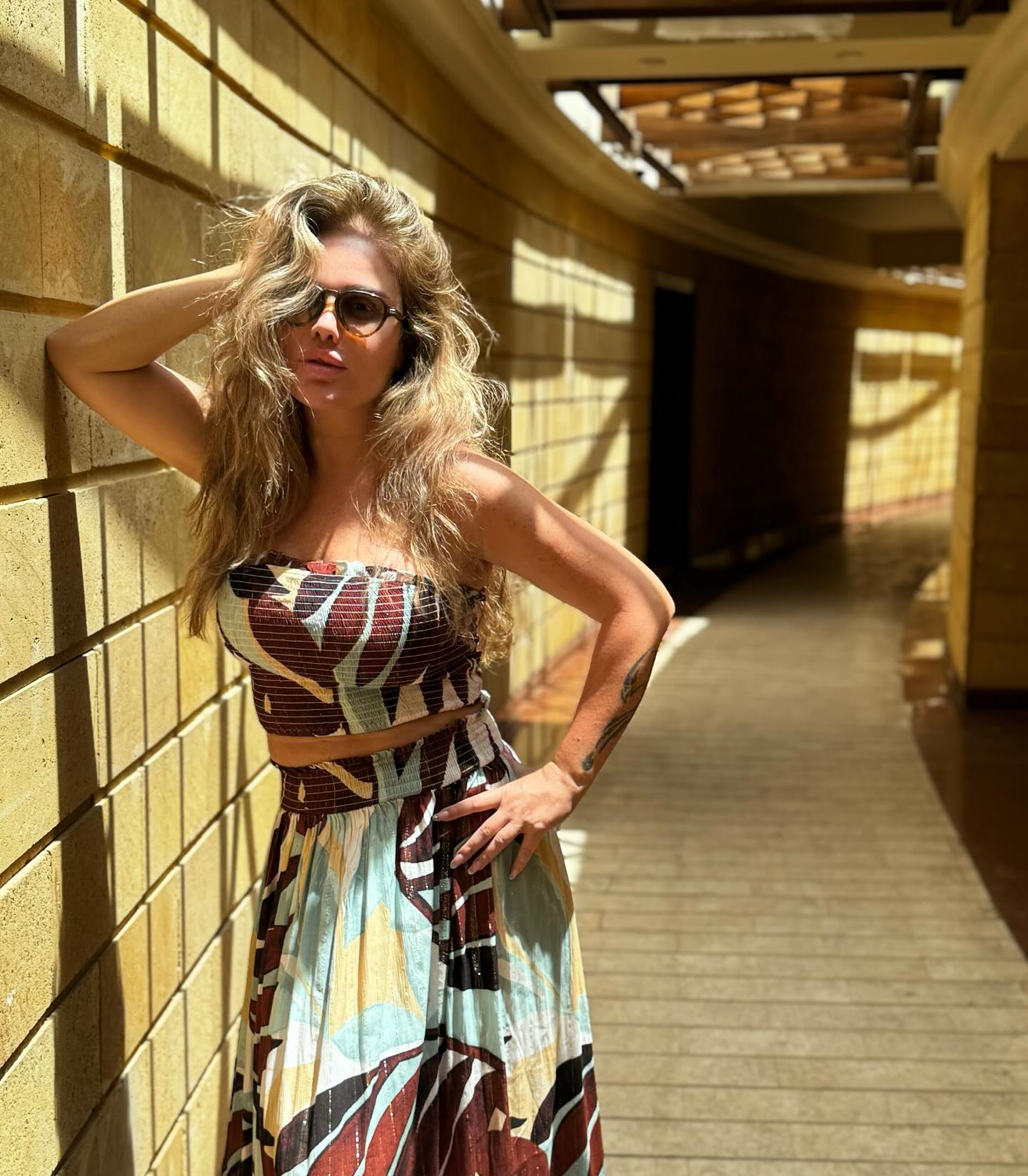 May be an image of 1 person, blonde hair and eyewear