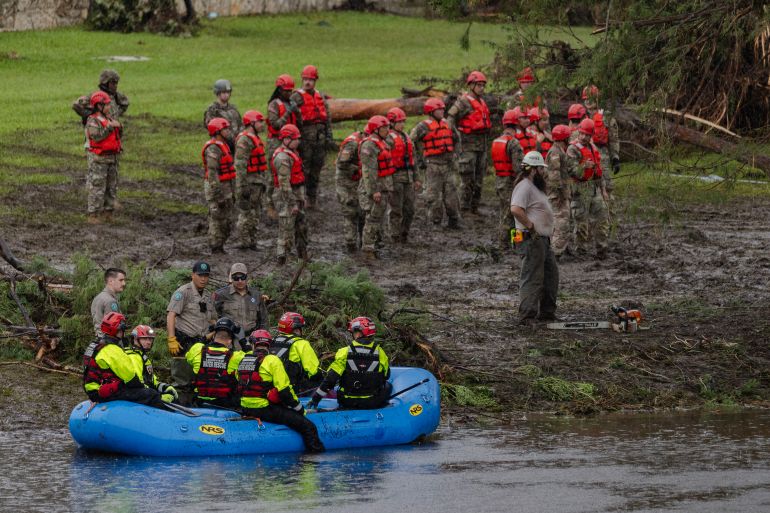 HUNT, TEXAS - JULY 6: Search and recovery workers dig through debris looking for any survivors or remains of people swept up in the flash flooding at Camp Mystic on July 6, 2025 in Hunt, Texas. Heavy rainfall caused flooding along the Guadalupe River in central Texas with multiple fatalities reported. Jim Vondruska/Getty Images/AFP (Photo by Jim Vondruska / GETTY IMAGES NORTH AMERICA / Getty Images via AFP)