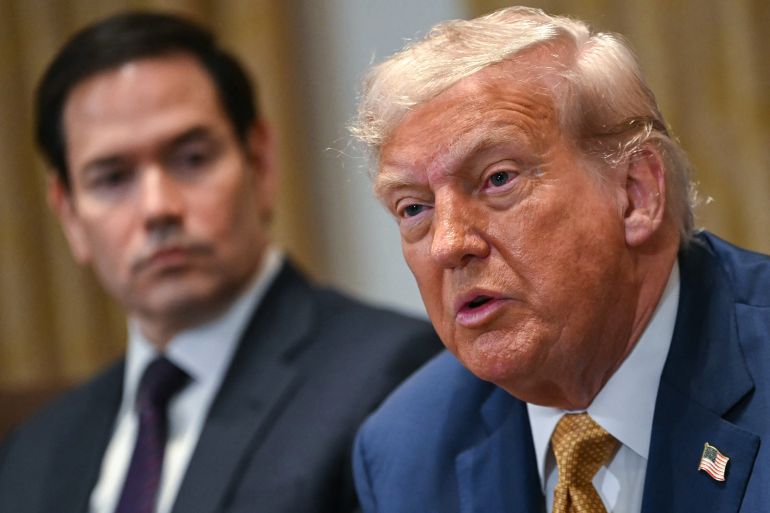 TOPSHOT - US President Donald Trump speaks as Secretary of State Marco Rubio (L) looks on during a cabinet meeting in the Cabinet Room of the White House in Washington, DC, on July 8, 2025. (Photo by ANDREW CABALLERO-REYNOLDS / AFP)
