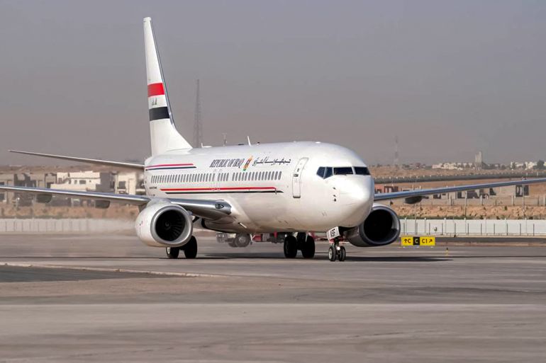 TOPSHOT - This handout picture released by Iraq's Prime Minister's Media Office shows the official government plane on the tarmac during the re-opening of Mosul International Airport in northern Iraq on July 16, 2025.