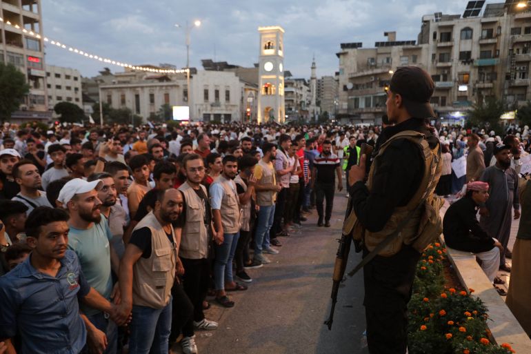 People take to the streets of Hama to protest against Israeli intervention in Syria, on July 16, 2025.