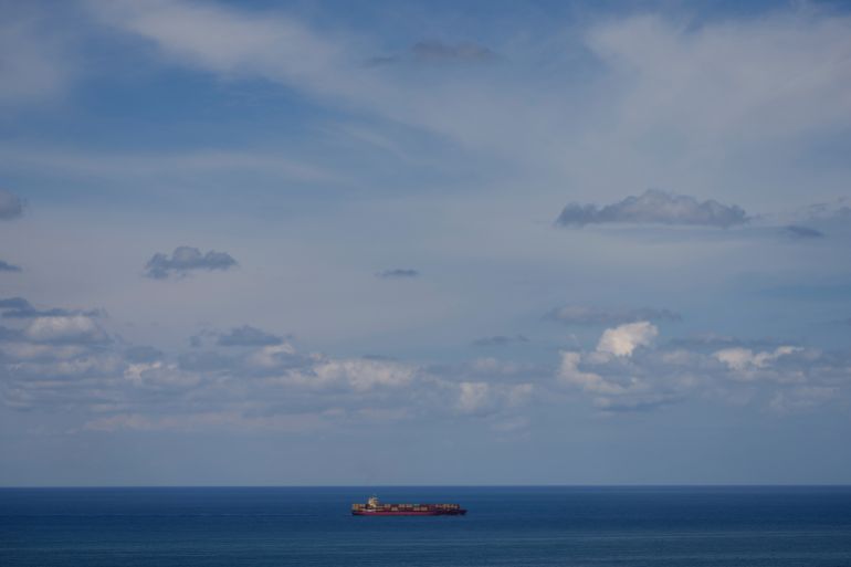 A cargo ship navigates in the Mediterranean Sea along the Beirut coastline, Lebanon, Sunday, April 13, 2025. (AP Photo/Hassan Ammar)