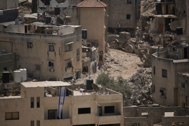 Destroyed houses during the Israeli forces ground operations are seen at the Nur Shams refugee camp, in the West Bank city of Tulkarem, Wednesday, July 2, 2025. (AP Photo/Leo Correa)