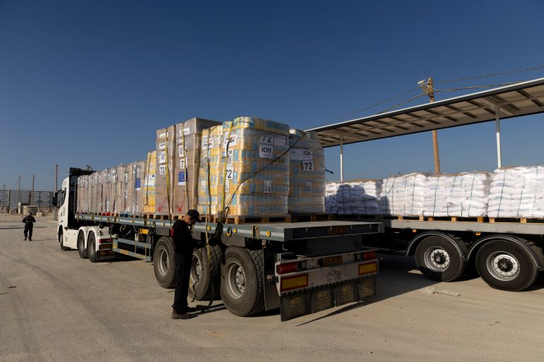EREZ WEST CROSSING, ISRAEL - NOVEMBER 11: A driver prepares a truck carrying humanitarian aid before crossing into the Gaza Strip on November 11, 2024 in Erez West Crossing, Israel. Last month, the UN's Acting Under-Secretary-General for Humanitarian Affairs and Emergency Relief, Joyce Msuya, said that Israel had blocked food aid from entering northern Gaza between October 2-15. According to the UN, more than 1.8 million Palestinians in Gaza are experiencing "extremely critical" levels of hunger. (Photo by Amir Levy/Getty Images)