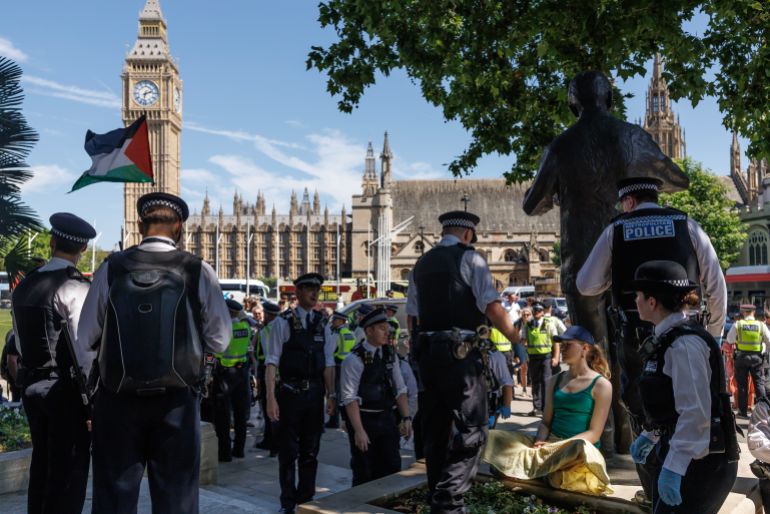 LONDON, UNITED KINGDOM - JULY 12: A protester is arrested as people take part in a protest against Palestine Action's proscription as a terrorist organisation at Parliament Square on July 12, 2025 in London, England. This protest is the second held by pro-Palestinian groups since the UK Parliament's decision to proscribe Palestine Action as a terror group. Yesterday, the UN Human Rights Office announced that 798 people have been killed while trying to access aid in Gaza since the end of May. (Photo by Dan Kitwood/Getty Images)