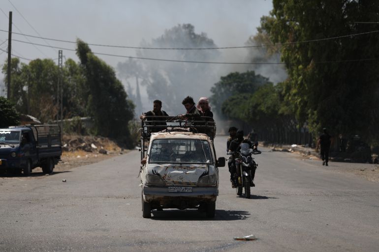 SWEIDA, SYRIA - JULY 18: Bedouin fighters are seen on the streets of al-Mazraa village in Syria's southern Sweida governorate on July 18, 2025 in Sweida, Syria. Fighting has flared up again between the Bedouin tribe and Druze sect in the southern Syrian province of Suwayda, as another ceasefire has collapsed a day after Syrian troops pulled out of the area. (Photo by Ali Haj Suleiman/Getty Images)