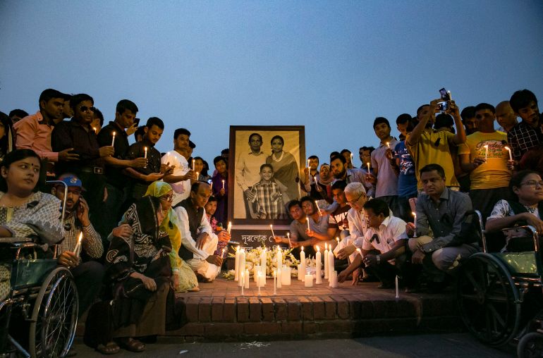 DHAKA, BANGLADESH - MARCH 15: People attend a candlelight vigil for the victims of the US-Bangla plane crash on March 15, 2018 in Dhaka, Bangladesh. At least 50 people were killed on Monday when a passenger plane from Bangladesh crashed and burst into flames as it was attempting to land at Kathmandu's Tribhuvan airport. The plane crash is known to be the worst aviation disaster to hit Nepal in years while investigations had begun into the cause of the crash. (Photo by Allison Joyce/Getty Images)