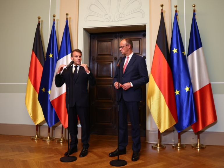 BERLIN, GERMANY - JULY 23: German Chancellor Friedrich Merz and French President Emmanuel Macron talk to media prior to talks at Villa Borsig on July 23, 2025 in Berlin, Germany. The two leaders are meeting as Germany, France and the United Kingdom forge a stronger European alliance following U.S. President Donald Trump's disruption of transatlantic ties. (Photo by Christian Mang/Getty Images)