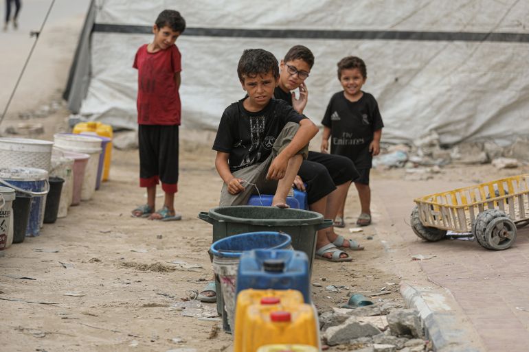 GAZA CITY, GAZA - AUGUST 1: Children are seen as the Palestinians sheltering in tents and damaged buildings struggle daily to access food, water, and other basic necessities amid ongoing Israeli attacks at the western Camiat area in Gaza City, Gaza on August 1, 2025. (Photo by Dawoud Abo Alkas/Anadolu via Getty Images)