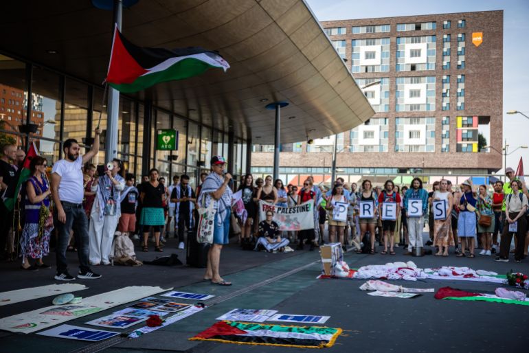 epa12300781 People gather during the protest Nijmegen for Palestine (NfP) in solidarity with Palestinians in Gaza, at the train station in Nijmegen, The Netherlands, 14 August 2025. Special attention was paid to Al Jazeera journalist Anas Al-Sharif, who was killed by the Israeli army, and his four colleagues. EPA/Marcel Krijgsman