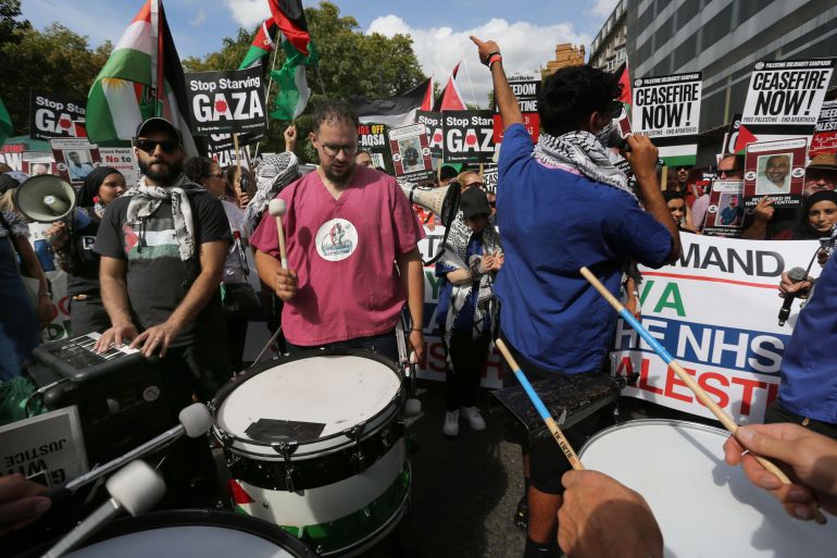 LONDON, ENGLAND - SEPTEMBER 06: Protesters march to the beat of a drum during the demonstration on September 6, 2025 in London, England. The National March for Palestine 'Stop Starving Gaza' is the 30th march since the war began in October 2023 and comes ahead of Israel's president Herzog visit to the UK next week. (Photo by Martin Pope/Getty Images)