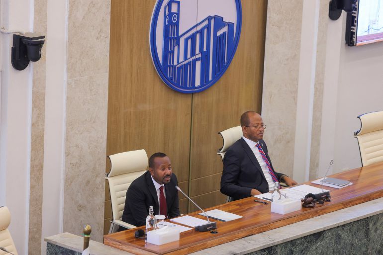 Ethiopia's Prime Minister Abiy Ahmed and the Speaker of the House of Peoples Representatives Tagesse Chafo address parliament members on the current situation of the country at the parliament building, in Addis Ababa, Ethiopia, March 20, 2025. REUTERS/Tiksa Negeri
