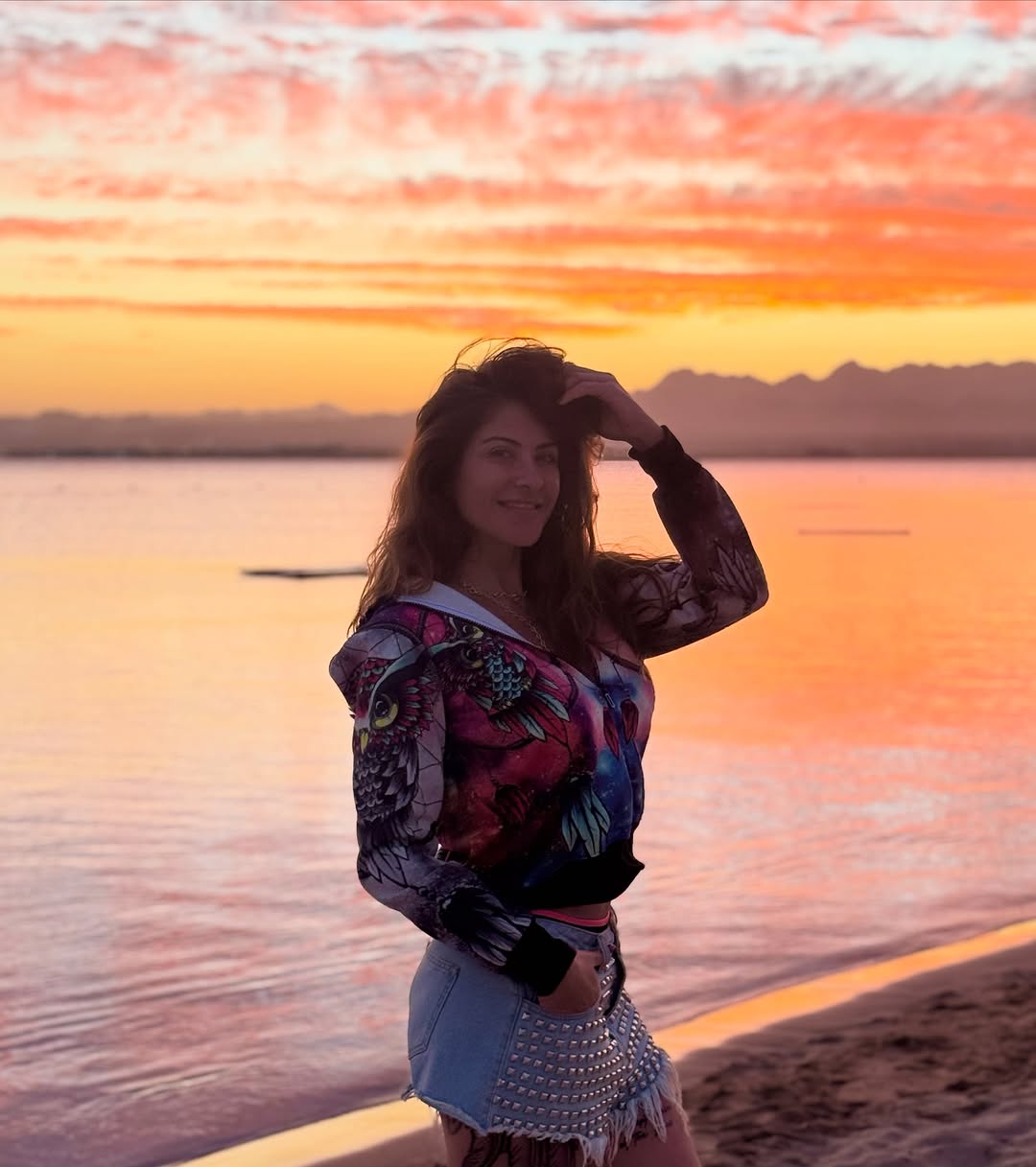 May be an image of beach and ocean