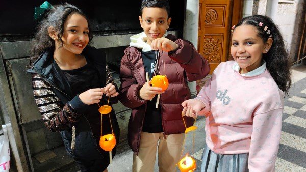 أطفال بورسعيد المسيحيون يحتفلون بالبلابيصا
