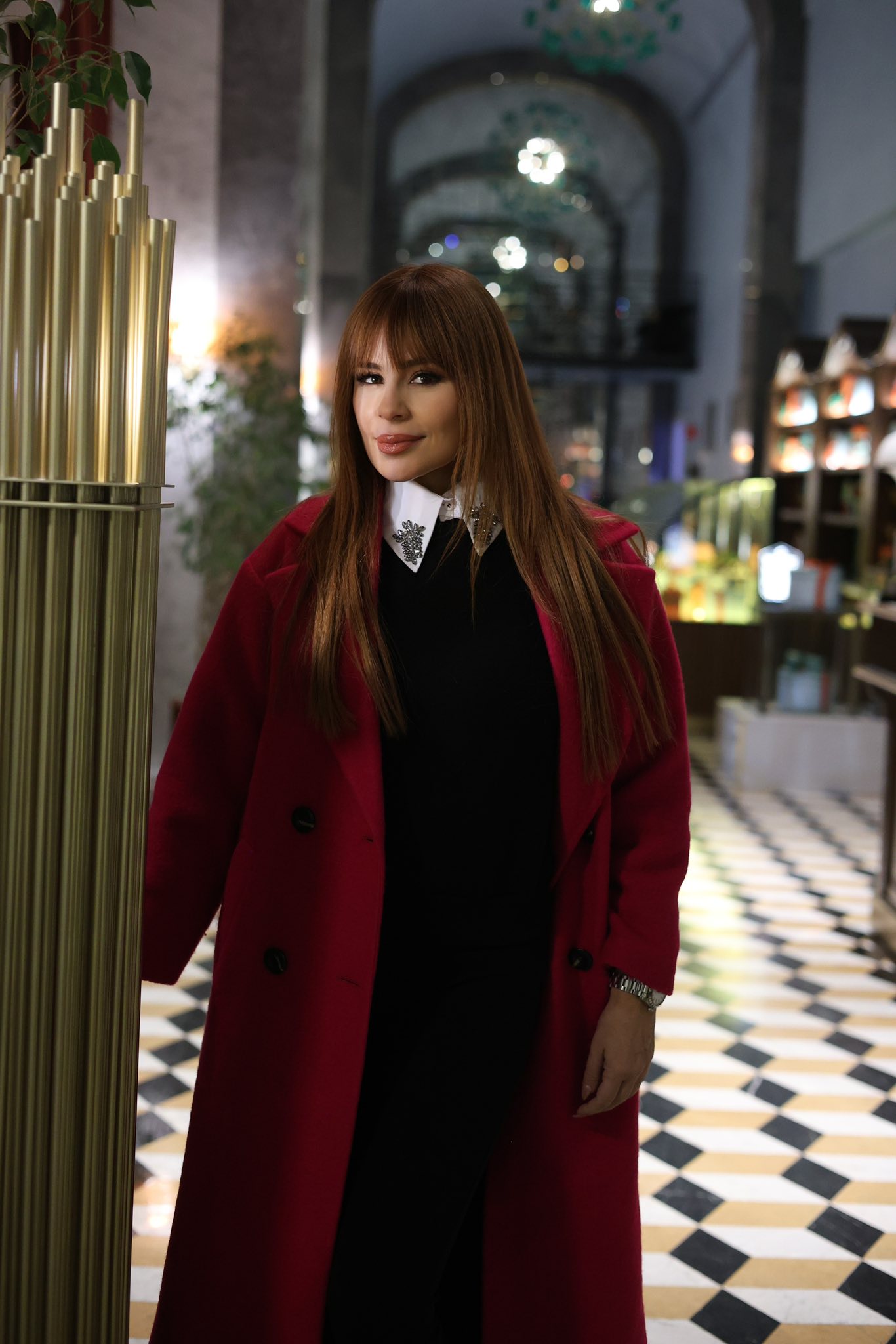 May be an image of overcoat and duffel coat