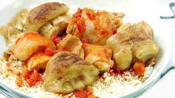 لعزومات العيد.. طريقة عمل فتة بالكوارع