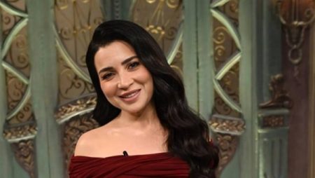 مي عز الدين تتألق بفستان خمري أنيق في “صاحبة السعادة”