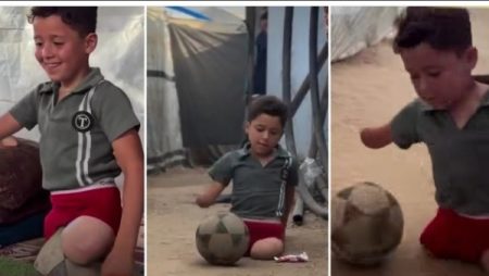 بلا ساقين وبـ يد واحدة.. طفل يتحدى إعاقته ويلعب كرة القدم بين خيام النازحين في غزة