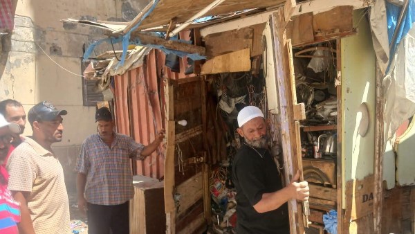 ضواحي بورسعيد يداهم معاقل اشغالات منطقة الأمل | صور
