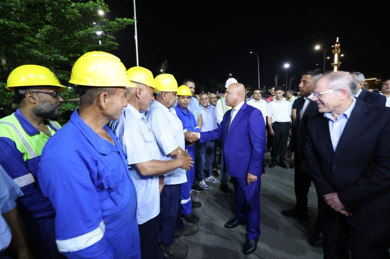 May be an image of one or more people and oil refinery