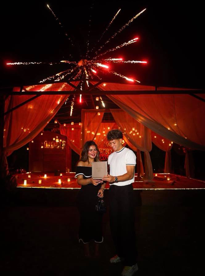 May be an image of lighting, fireworks and wedding